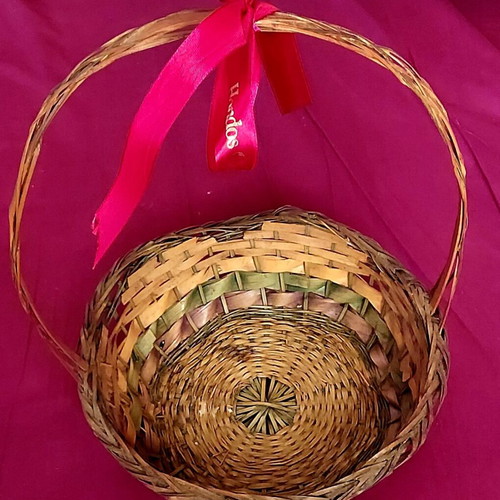 Wicker Easter basket used with red ribbon