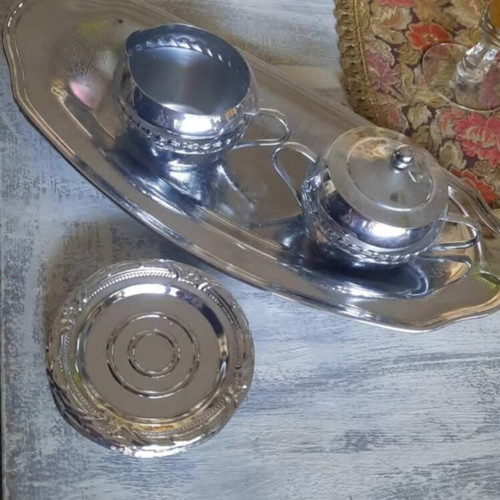 Stainless steel set with creamer, sugar bowl, coasters and tray like new