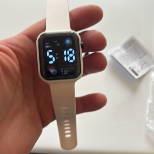 Electronic wristwatch new, white, analog