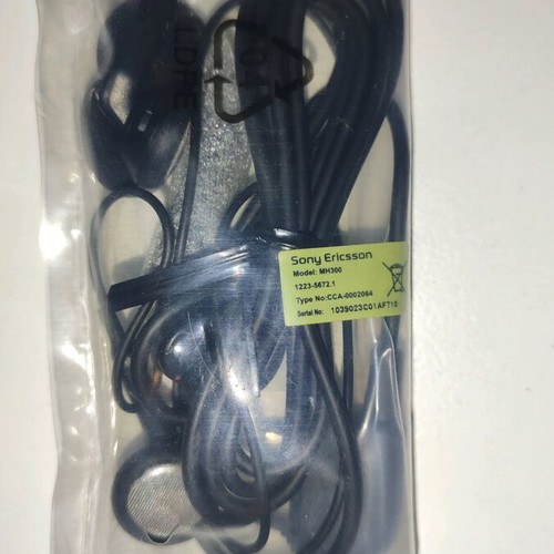 Sony Ericsson W595 Walkman Pink Edition used with accessories