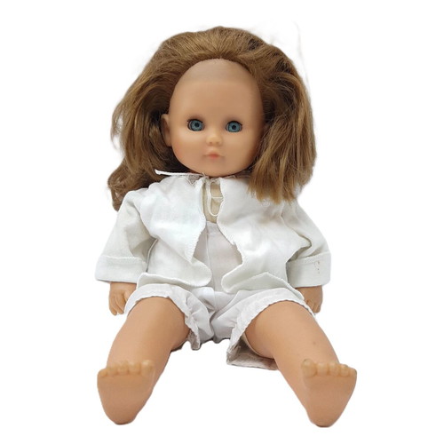 Vintage hard plastic doll with blue sleeping eyes, 1970s