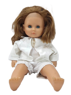 Vintage hard plastic doll with blue sleeping eyes, 1970s