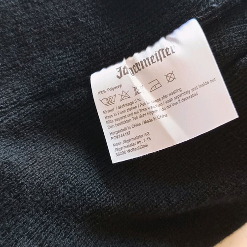 Jägermeister orange ear-flap beanie with pom-pom used like new