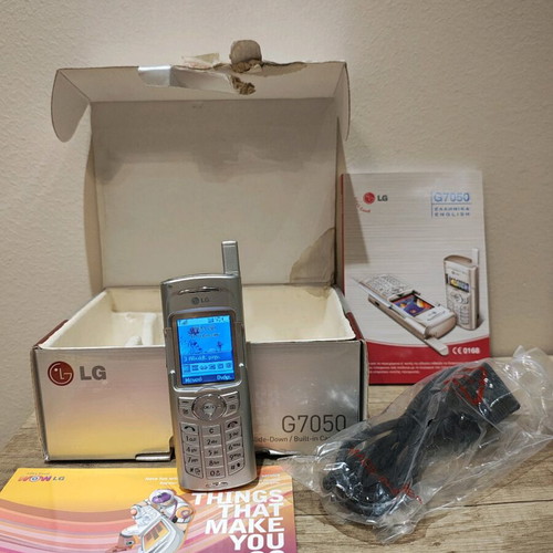 LG G7050 used with box, charger and papers