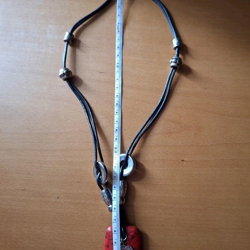 Women's necklace with red stone pendant and silver accessories like new