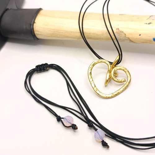 Handmade heart pendant brass with pink Swarovski beads and black nylon cord