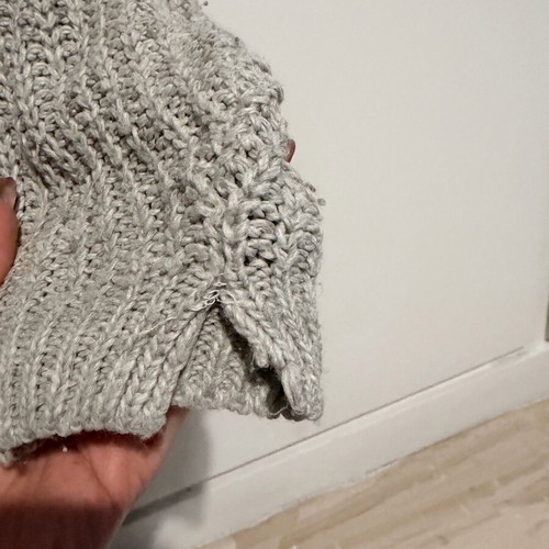 Gray sweater used, size M, with seam wear on sleeves