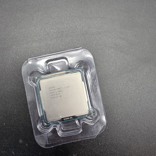 Intel Core i3-2100 and Pentium E5200 processors used with original coolers