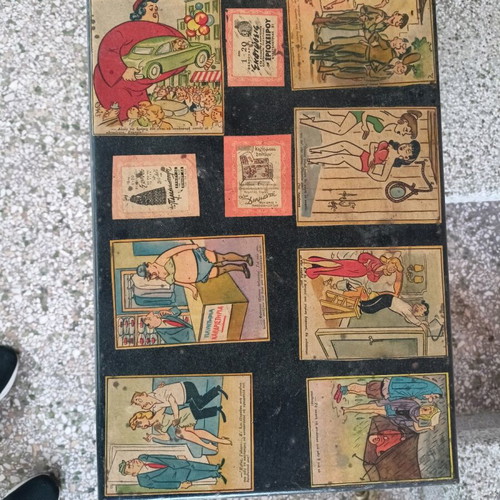 Table used iron with comic designs