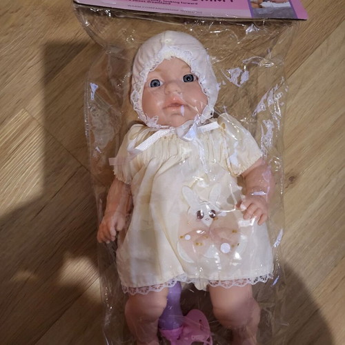 Baby doll with many sounds and 1 outfit, new