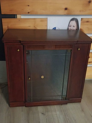 Spanish TV stand new, cherry brown with rotating base