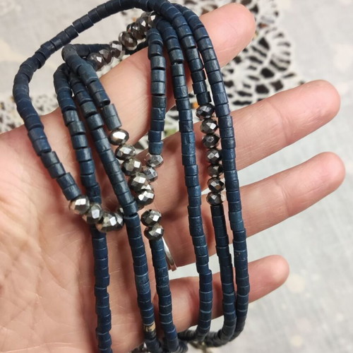 Long necklace double strand in dark blue and shiny black beads, like new