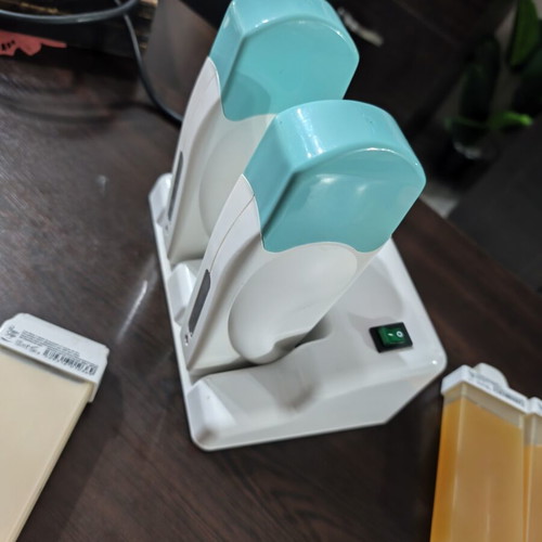 Double Wax Heater like new with 10 wax cartridges