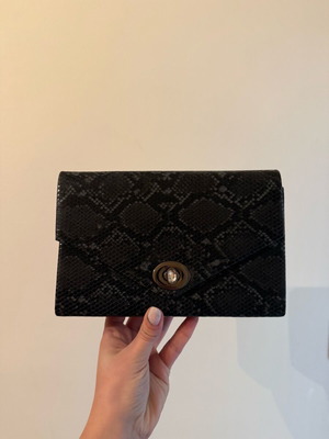 Envelope-style wrist bag with chain like new, black