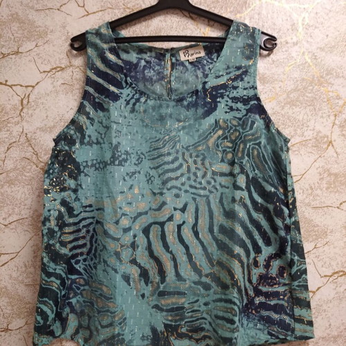 Women's cotton top with metallic gold shine and abstract animal print