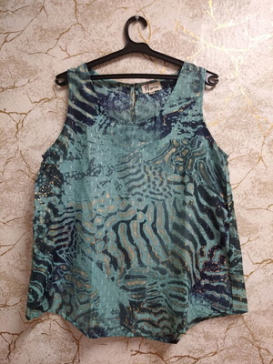 Women's cotton top with metallic gold shine and abstract animal print