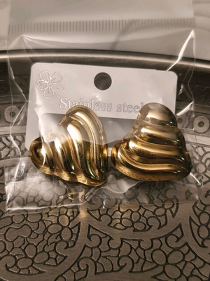 Heart-shaped clip-on earrings new, gold color with embossed design