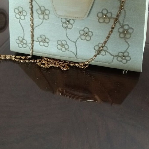 Small gold handbag with handle and long chain, like new