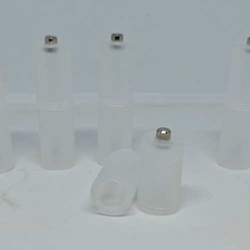 Battery adapters AA to C set of 8, like new, plastic transparent
