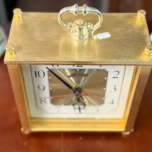 Table clock with gold surface like new, analog quartz