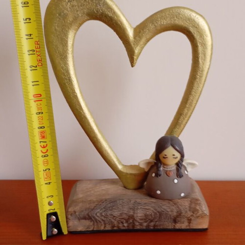Decorative heart-shaped ornament with angel like new