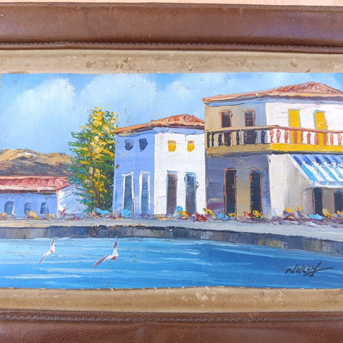 Handmade painting on canvas in leather tabletop frame, used