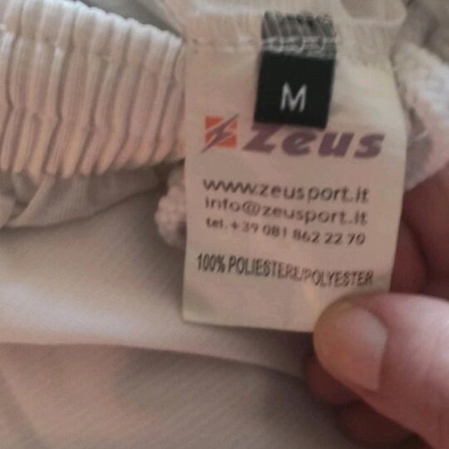 Zeus sportswear medium like new, white and turquoise