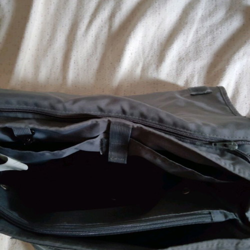 Lassig changing bag used, messenger with strap and spacious compartments
