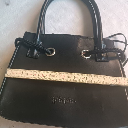 Folli Follie black women's handbag used, leather with red lining