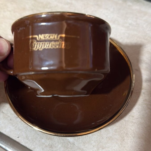 Nescafé Cappuccino Cup and Saucer like new with gold detail