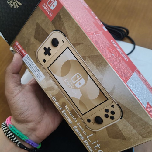 Nintendo Switch Lite Hyrule Edition with protective case
