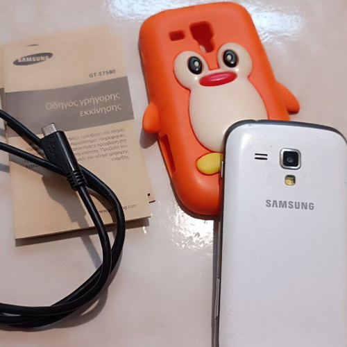Samsung Galaxy Trend Plus GT-S7580 white used with charger and case