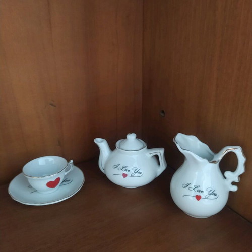 Miniature tea set used with gold line wear