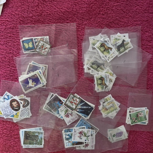 Stamp collection 23 packs with some complete series