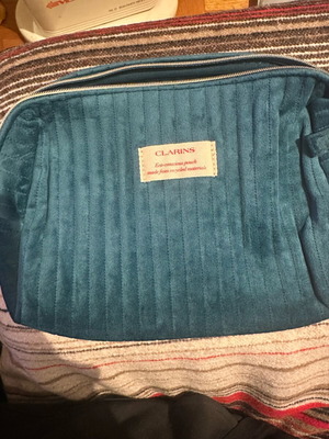 Clarins toiletry bag unused, turquoise