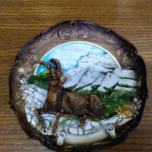 Decorative embossed wall plate with ibex motif like new