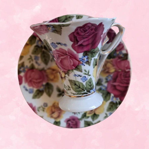 Porcelain cup with saucer like new, floral design