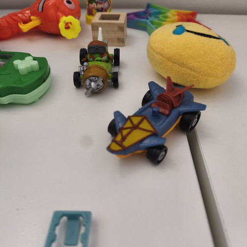 Various toys used, bubble bottle empty