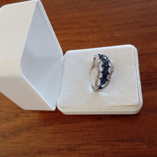 Ring with blue and silver zircon stones, new, size 7