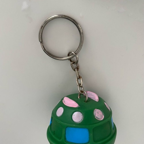 Vintage UFO keychain inflatable flying saucer like new, green