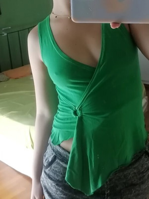 Green blouse with ring detail, size Small