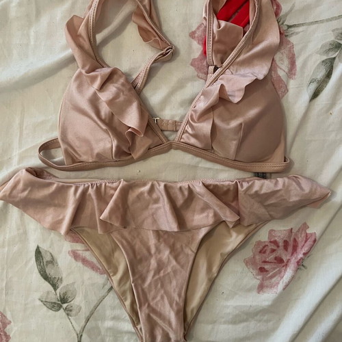 Swimwear used, set with new pink and green pieces