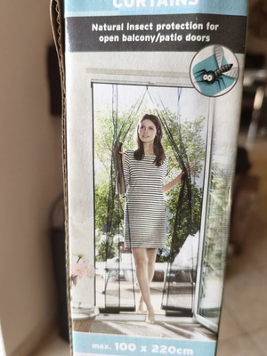 Door screen new with strips and adhesive base