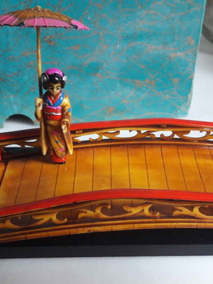 Chinese decorative woman on bridge new