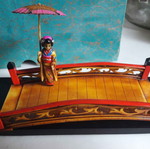 Chinese decorative woman on bridge new