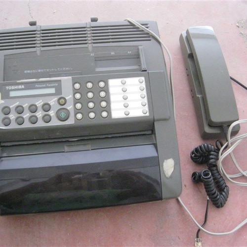 Toshiba fax used, 110 V, requires transformer