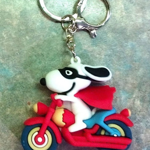 Snoopy figure on motorcycle new, collectible