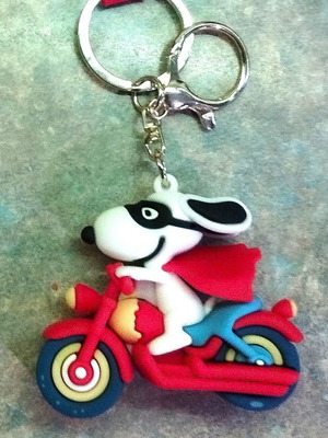 Snoopy figure on motorcycle new, collectible