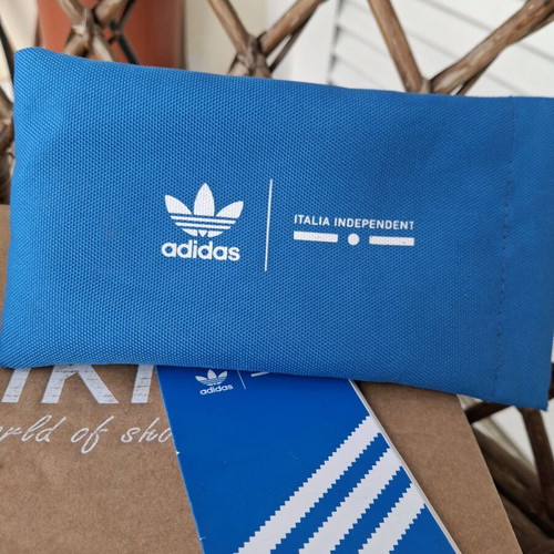 Adidas sunglasses used, black matte with blue mirror lens