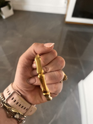 Steel bracelet like new, gold tone